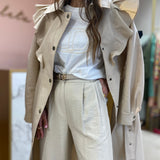 Beige Twinset trench coat with ruffles