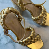 Sandália alta Twinset com tranças douradas